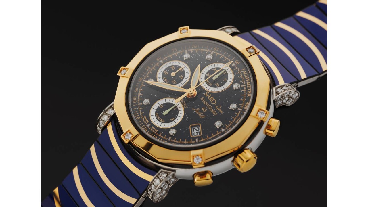 Modell - BuonGusto 43 Jubilé, Zifferblatt, Bandhalter und Gold-Lunette mit Brillanten.