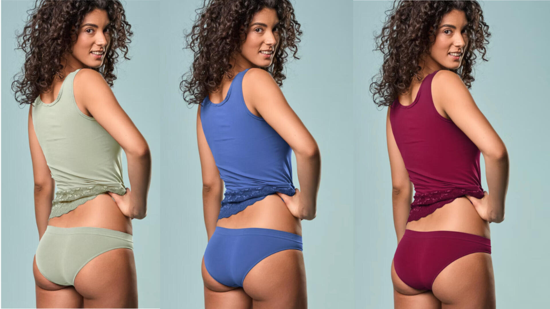 Eine Frau mit lockigem Haar modelliert passende Tanktops und Unterwäsche in drei Farben: hellgrün, blau und bordeauxrot, die nebeneinander von hinten vor einem hellblauen Hintergrund gezeigt werden.